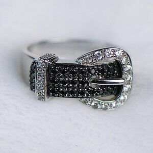 Adorable "belt" ring made from sterling silver with tiny diamonds. Weight = 5.4g